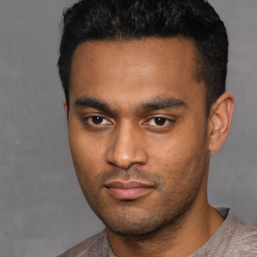 Neutral latino young-adult male with short  black hair and brown eyes