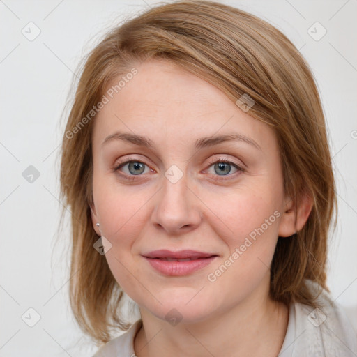 Joyful white young-adult female with medium  brown hair and blue eyes