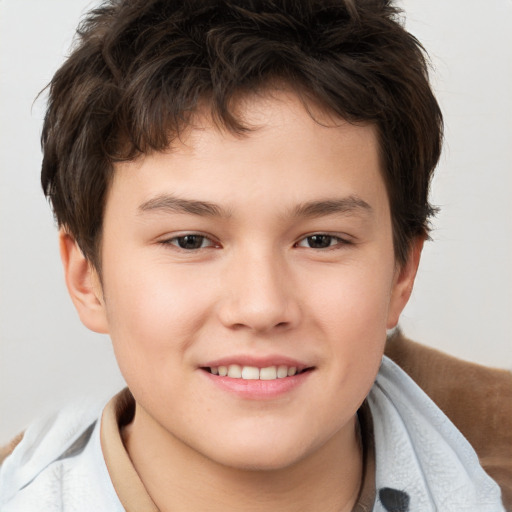 Joyful white child male with short  brown hair and brown eyes