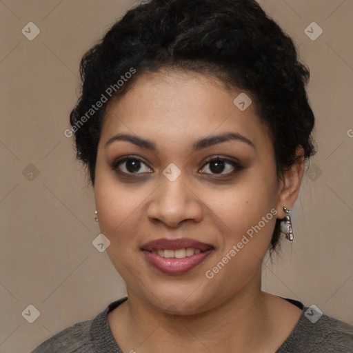 Joyful latino young-adult female with short  black hair and brown eyes