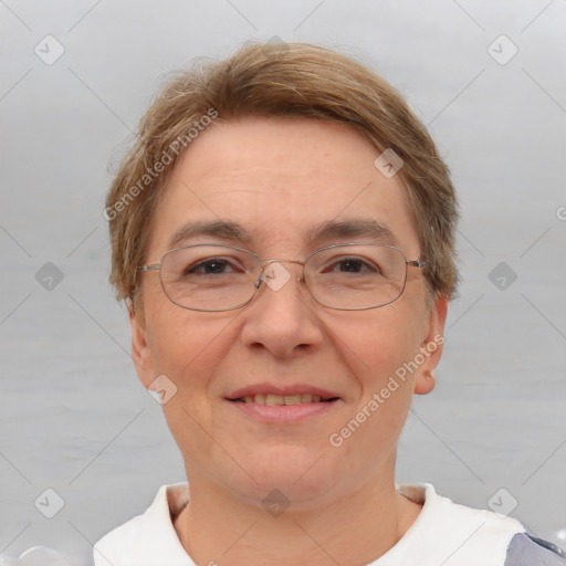 Joyful white adult female with short  brown hair and brown eyes