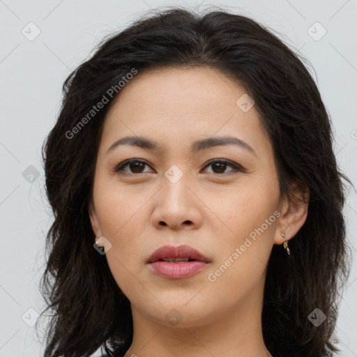 Joyful asian young-adult female with long  brown hair and brown eyes