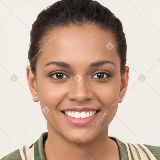 Joyful latino young-adult female with short  brown hair and brown eyes