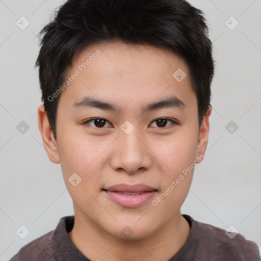 Joyful asian young-adult male with short  brown hair and brown eyes