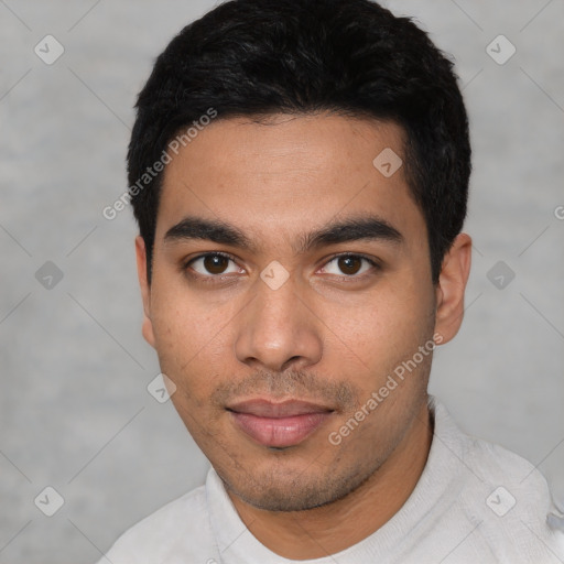 Neutral latino young-adult male with short  black hair and brown eyes