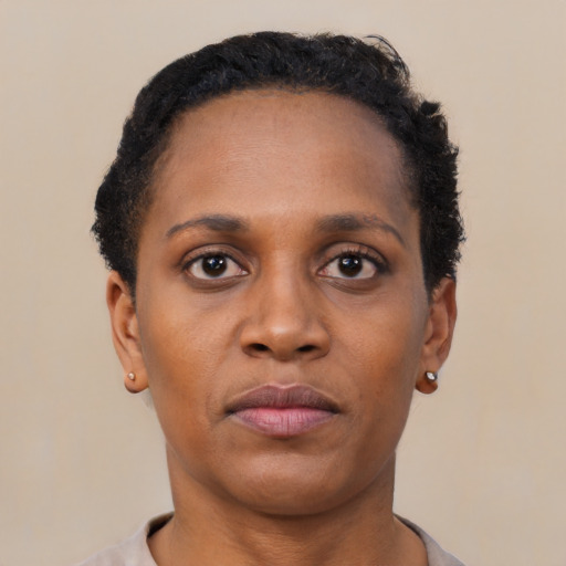 Neutral black young-adult female with short  brown hair and brown eyes