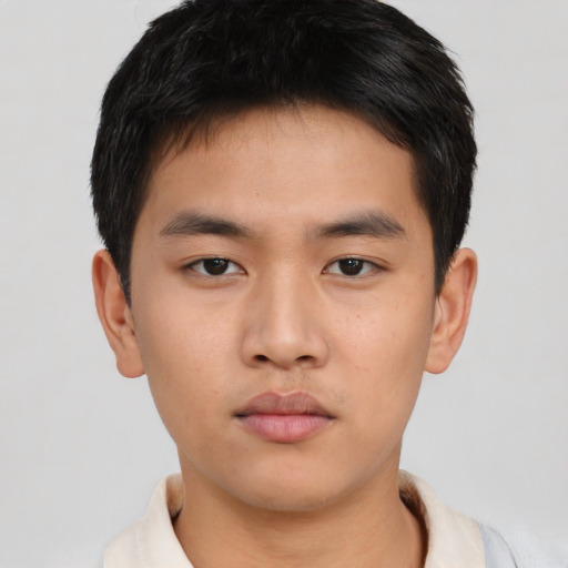 Neutral asian young-adult male with short  brown hair and brown eyes
