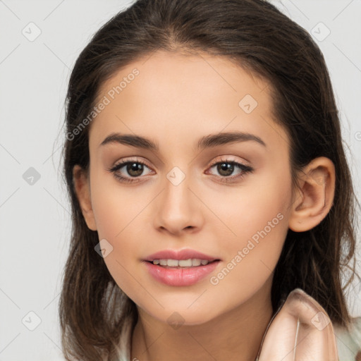 Joyful white young-adult female with long  brown hair and brown eyes