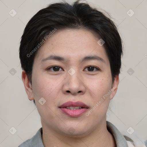 Joyful asian young-adult female with short  brown hair and brown eyes