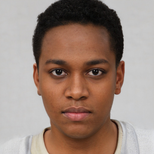 Neutral black young-adult male with short  brown hair and brown eyes
