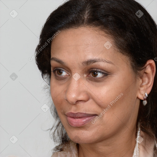 Joyful white adult female with medium  brown hair and brown eyes