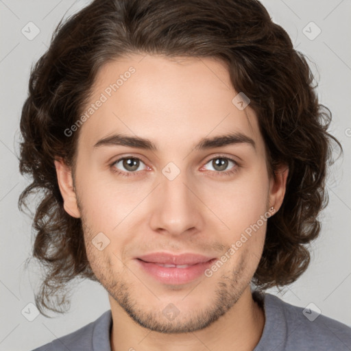 Joyful white young-adult male with medium  brown hair and brown eyes