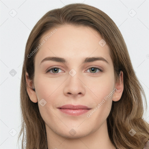 Joyful white young-adult female with long  brown hair and grey eyes