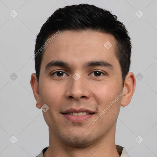 Joyful white young-adult male with short  black hair and brown eyes