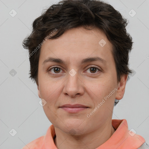 Joyful white adult female with short  brown hair and brown eyes