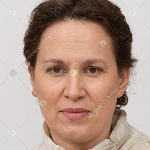 Joyful white adult female with short  brown hair and brown eyes