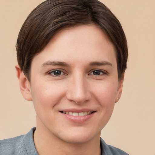 Joyful white young-adult female with short  brown hair and brown eyes