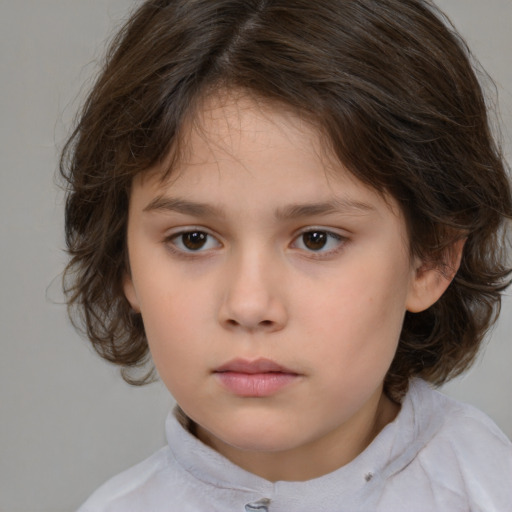 Neutral white child female with medium  brown hair and brown eyes