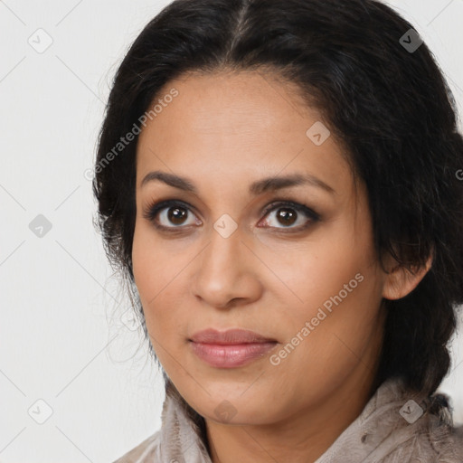 Joyful latino young-adult female with medium  brown hair and brown eyes