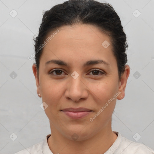 Joyful latino young-adult female with short  brown hair and brown eyes