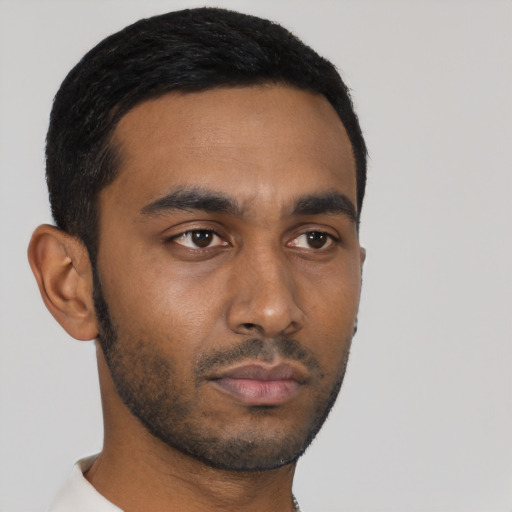 Neutral black young-adult male with short  black hair and brown eyes