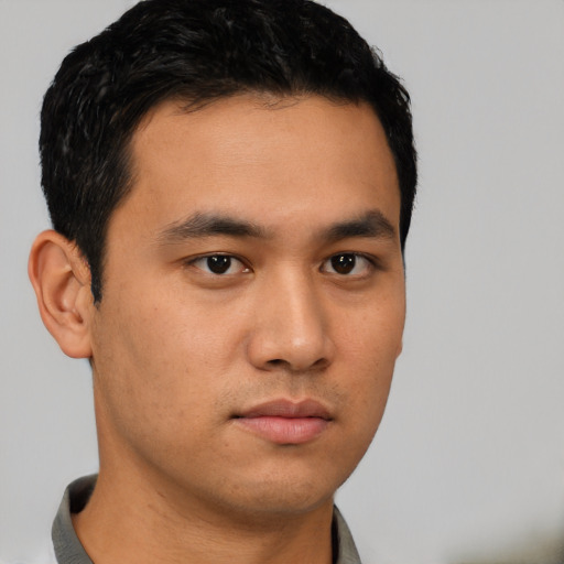 Neutral asian young-adult male with short  black hair and brown eyes