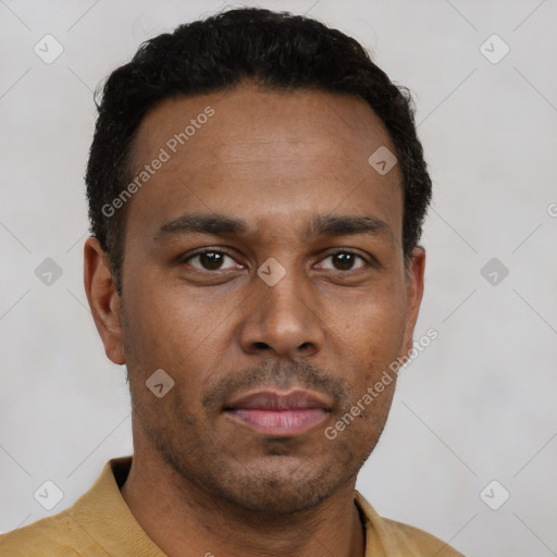 Neutral latino young-adult male with short  black hair and brown eyes