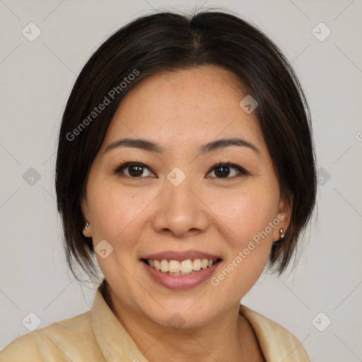 Joyful latino young-adult female with medium  brown hair and brown eyes