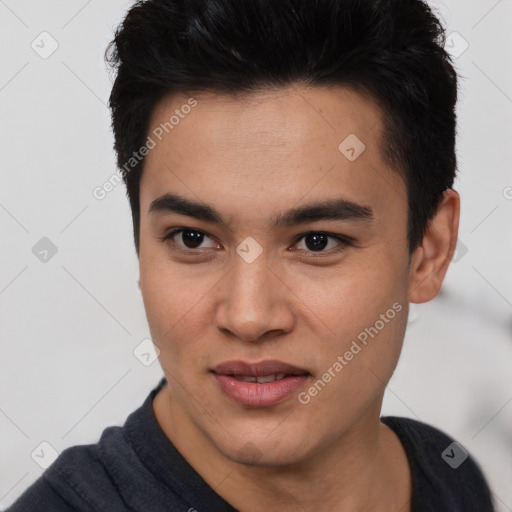 Joyful asian young-adult male with short  black hair and brown eyes