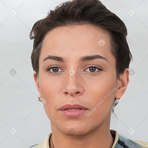 Neutral white young-adult female with short  brown hair and brown eyes