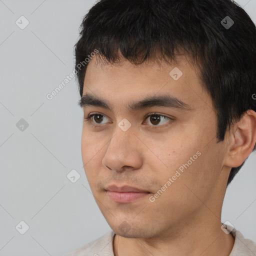 Neutral white young-adult male with short  black hair and brown eyes