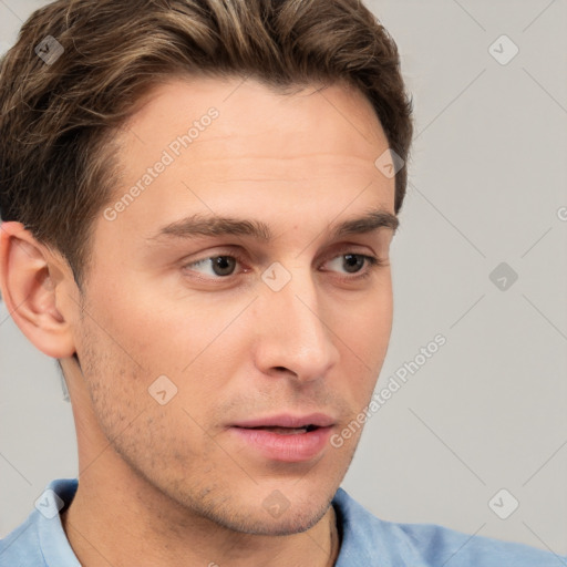 Neutral white young-adult male with short  brown hair and brown eyes