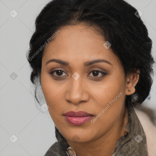 Joyful latino adult female with medium  brown hair and brown eyes