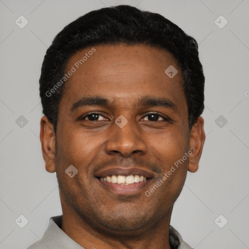 Joyful latino young-adult male with short  brown hair and brown eyes