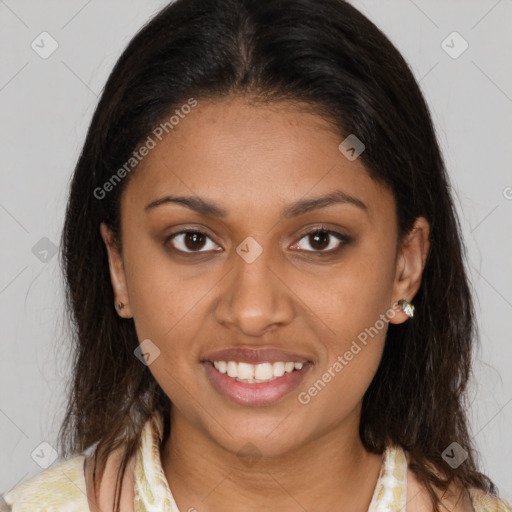 Joyful latino young-adult female with medium  brown hair and brown eyes