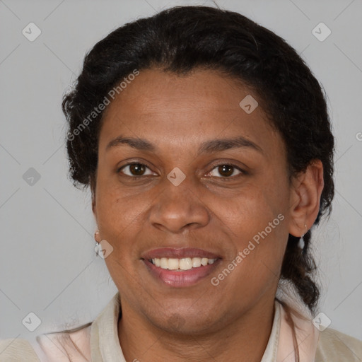 Joyful latino adult female with short  brown hair and brown eyes