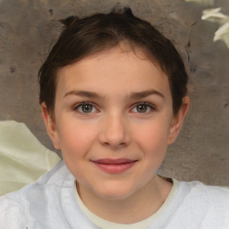 Joyful white child female with short  brown hair and brown eyes