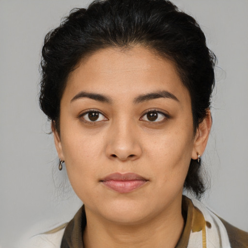 Neutral latino young-adult female with medium  brown hair and brown eyes