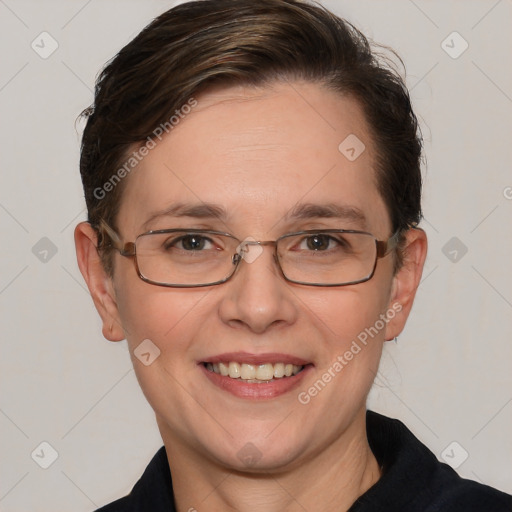 Joyful white adult female with short  brown hair and brown eyes