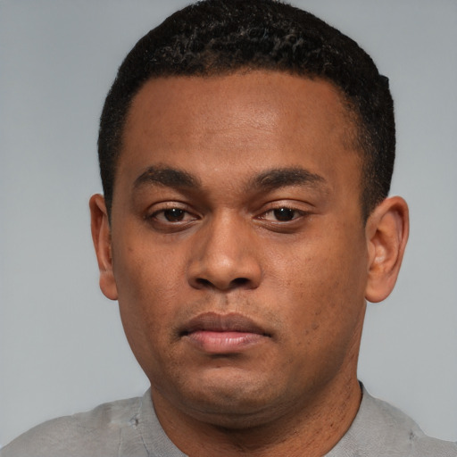 Neutral black young-adult male with short  black hair and brown eyes