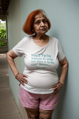 Indian elderly female with  ginger hair