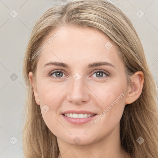 Joyful white young-adult female with long  brown hair and grey eyes