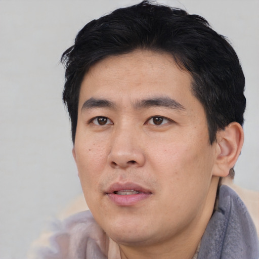 Neutral asian young-adult male with short  black hair and brown eyes