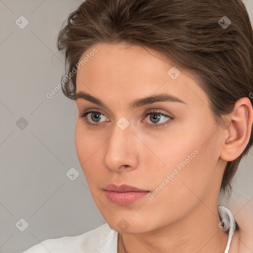 Neutral white young-adult female with medium  brown hair and brown eyes