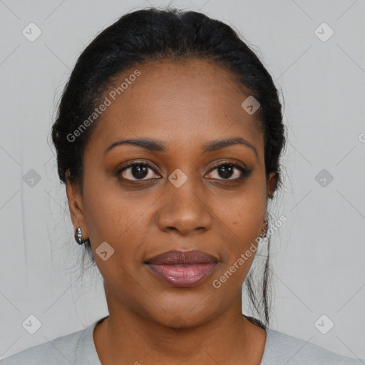Joyful black young-adult female with medium  black hair and brown eyes