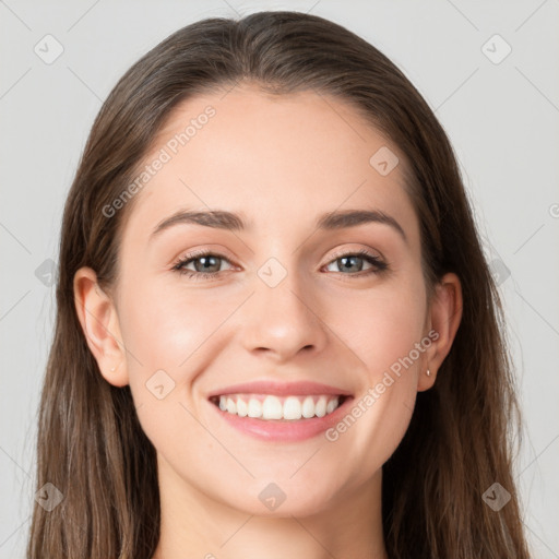 Joyful white young-adult female with long  brown hair and grey eyes