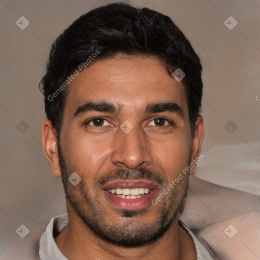 Joyful latino young-adult male with short  brown hair and brown eyes
