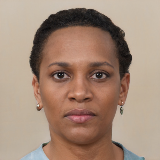 Neutral black young-adult female with short  black hair and brown eyes
