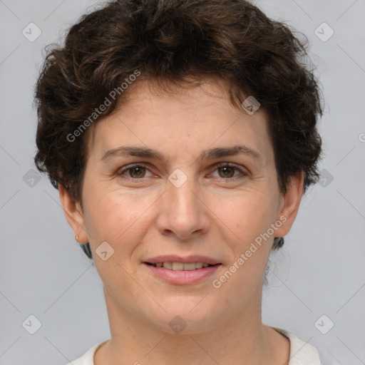 Joyful white adult female with short  brown hair and brown eyes