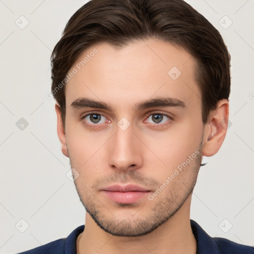 Neutral white young-adult male with short  brown hair and brown eyes